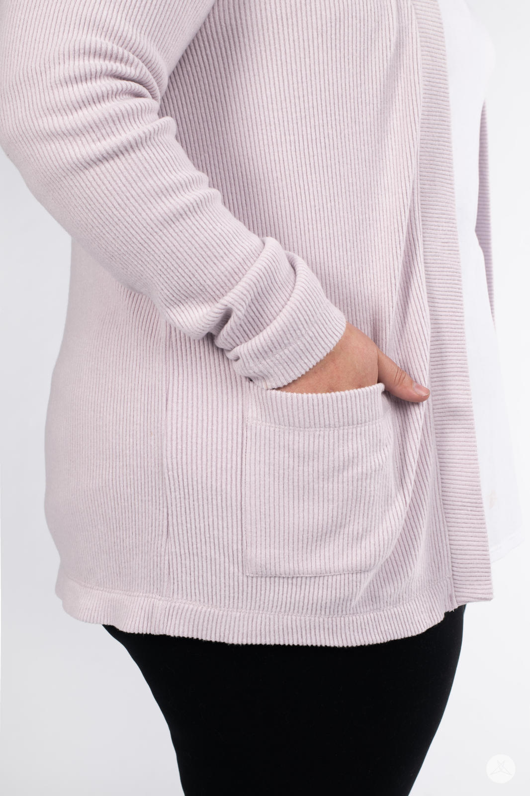 Close-up of hand in pocket showing ribbed texture of SweetLegs Canada Ribbed Comfort Cardigan in soft dusty pink
