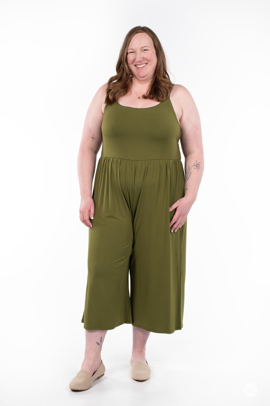 Plus-size model wearing SweetLegs Cropped Wide Leg Jumpsuit in olive green with sleeveless scoop neck and relaxed fit front view