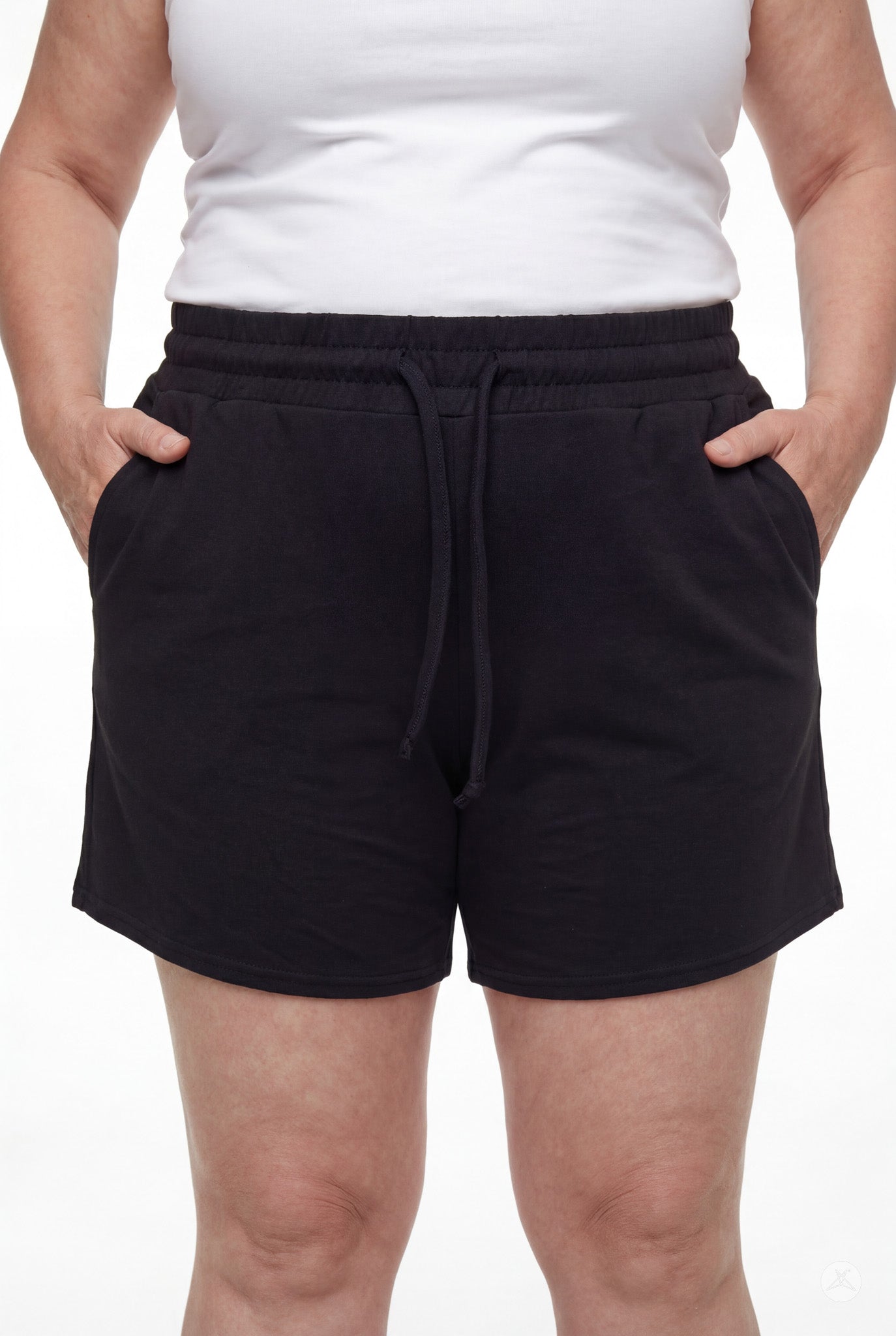 Front view of person wearing black Lounge Shorts with drawstring waist and pockets by SweetLegs against white background