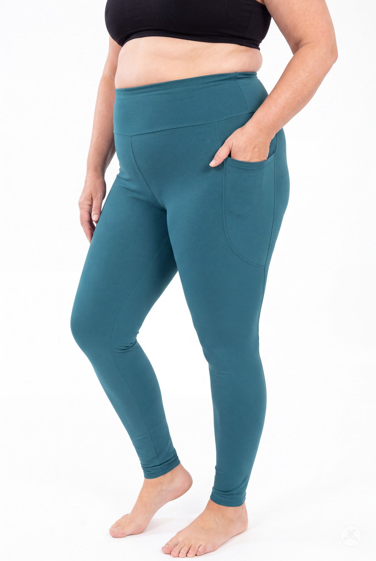 SweetLegs Deep Teal High-Waisted Pocket Leggings worn by a barefoot model with one hand in the pocket