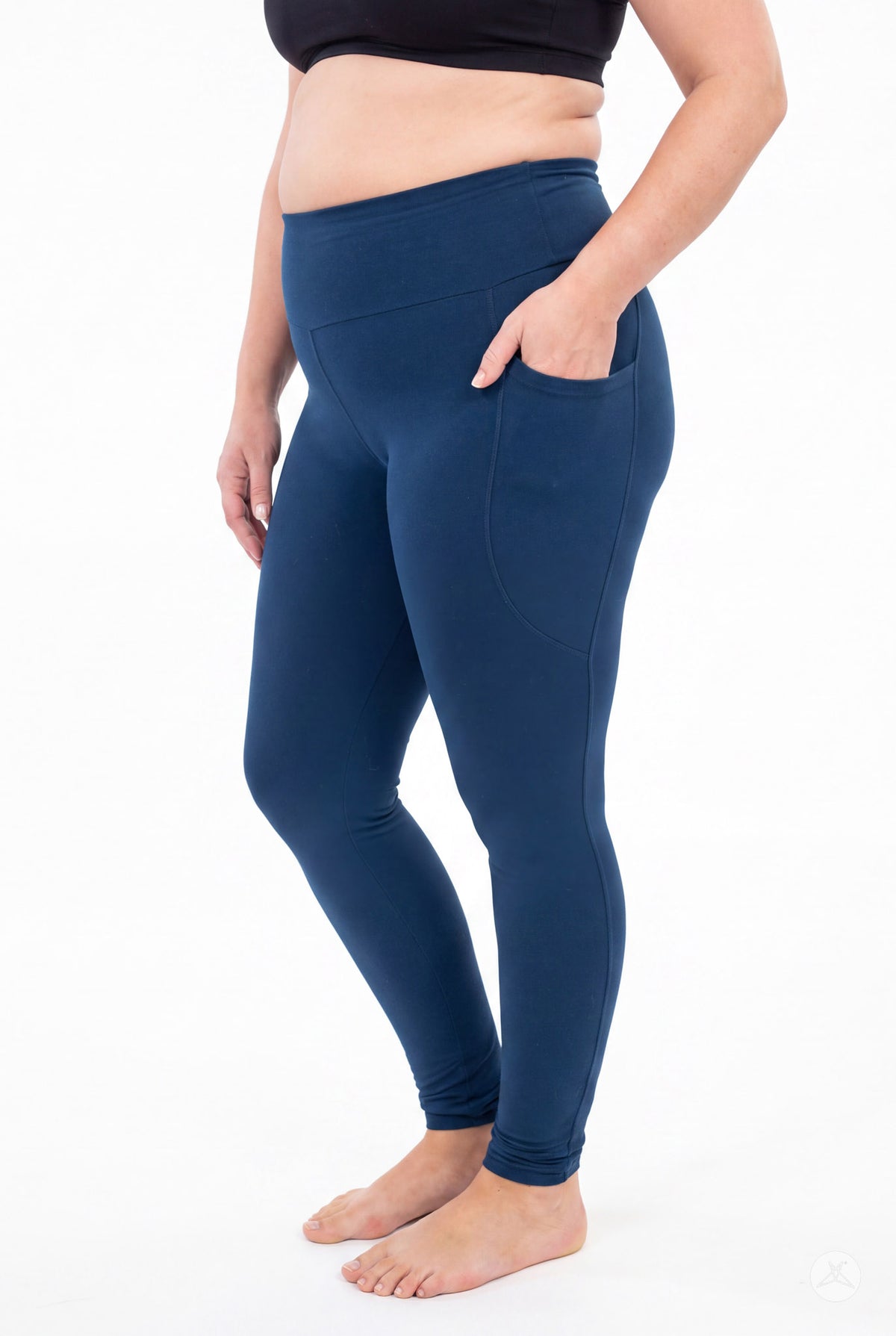 SweetLegs Still Water High-Waisted Pocket Leggings worn by a model with one hand in the pocket