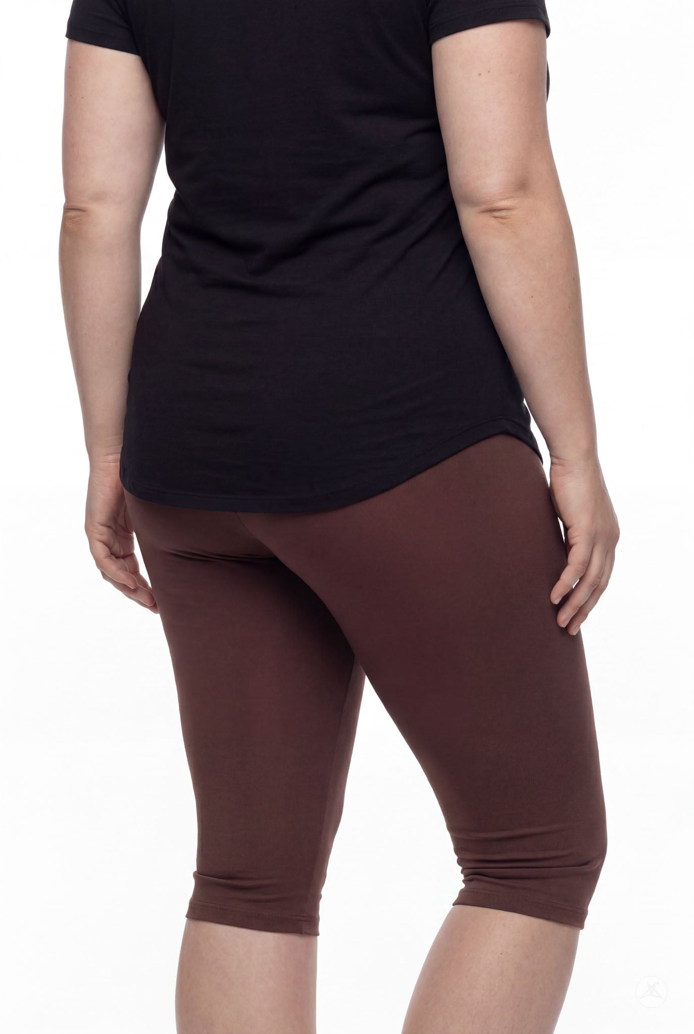 Person wearing SweetLegs Knee-Length Capri in rich walnut brown with black top shown from back on white background