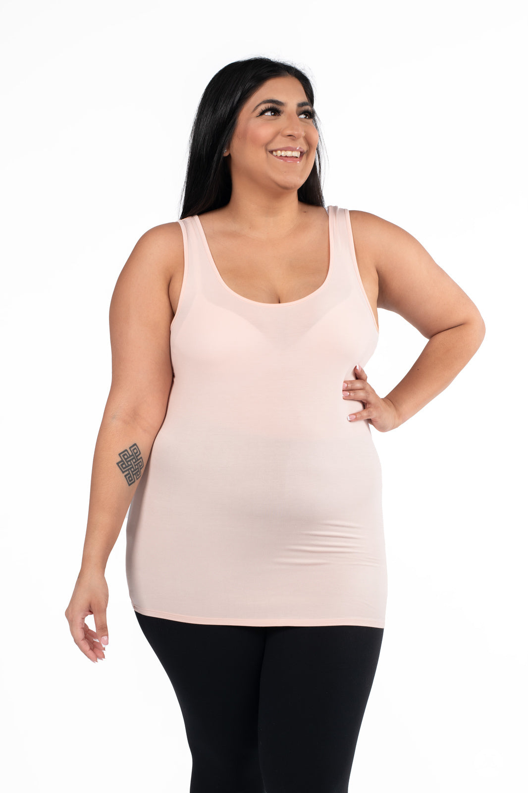 Smiling woman wearing SweetLegs Canada Classic Layering Tank in pale pink with a smooth, soft fit on white background