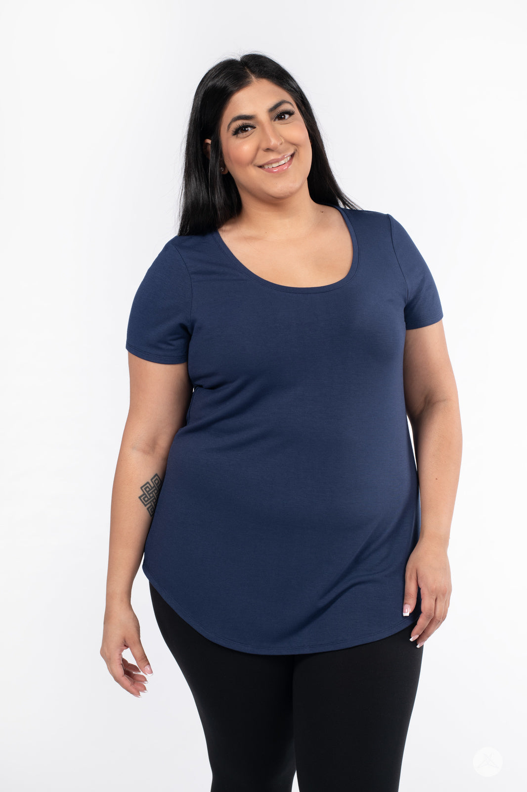 Plus-size woman wearing SweetLegs Canada Scoop Neck Tee in navy with curved hem and short sleeves front view