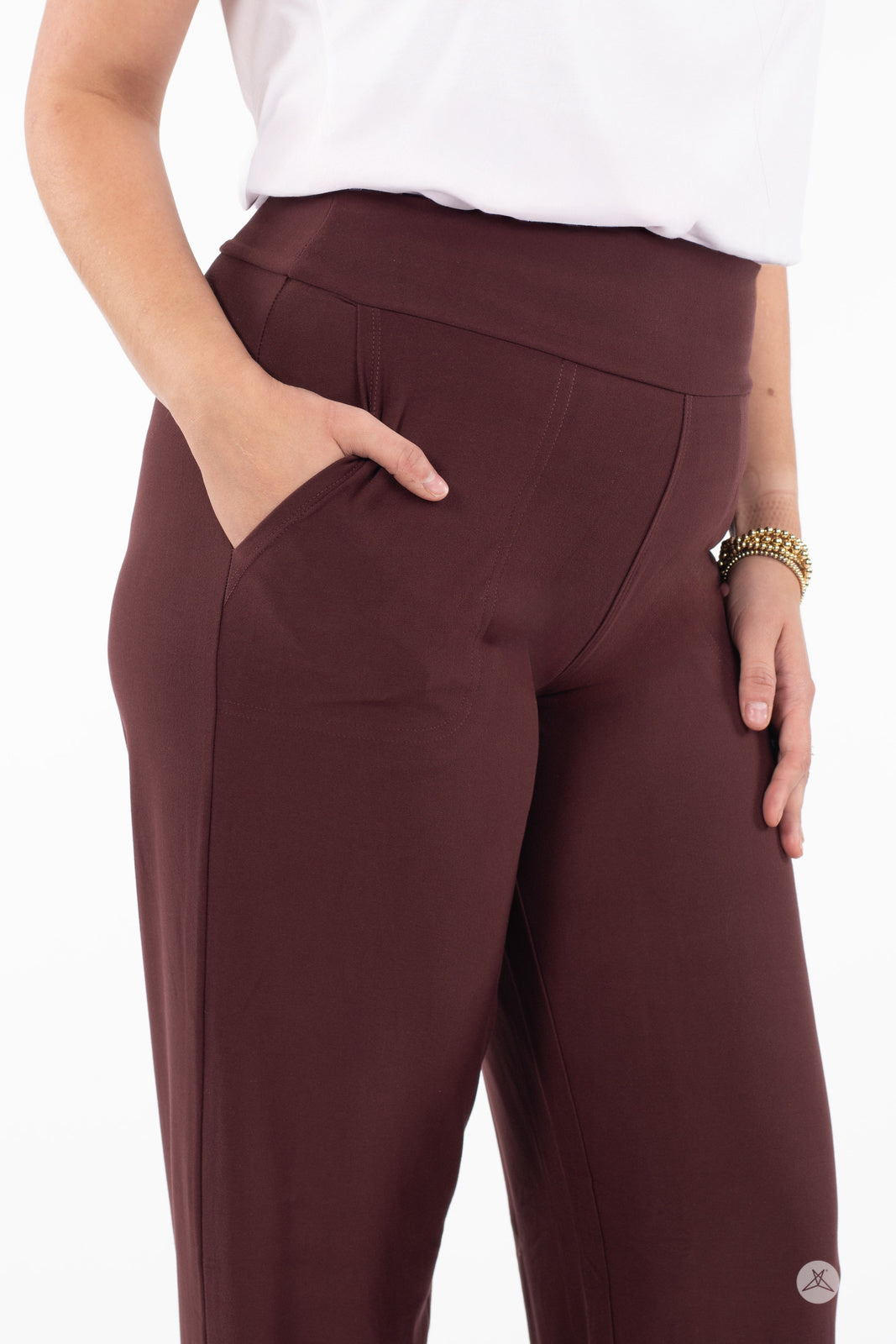 Close-up of SweetLegs High-Waist Wide Leg Pants in deep brown showing hand in side pocket and smooth fabric detail