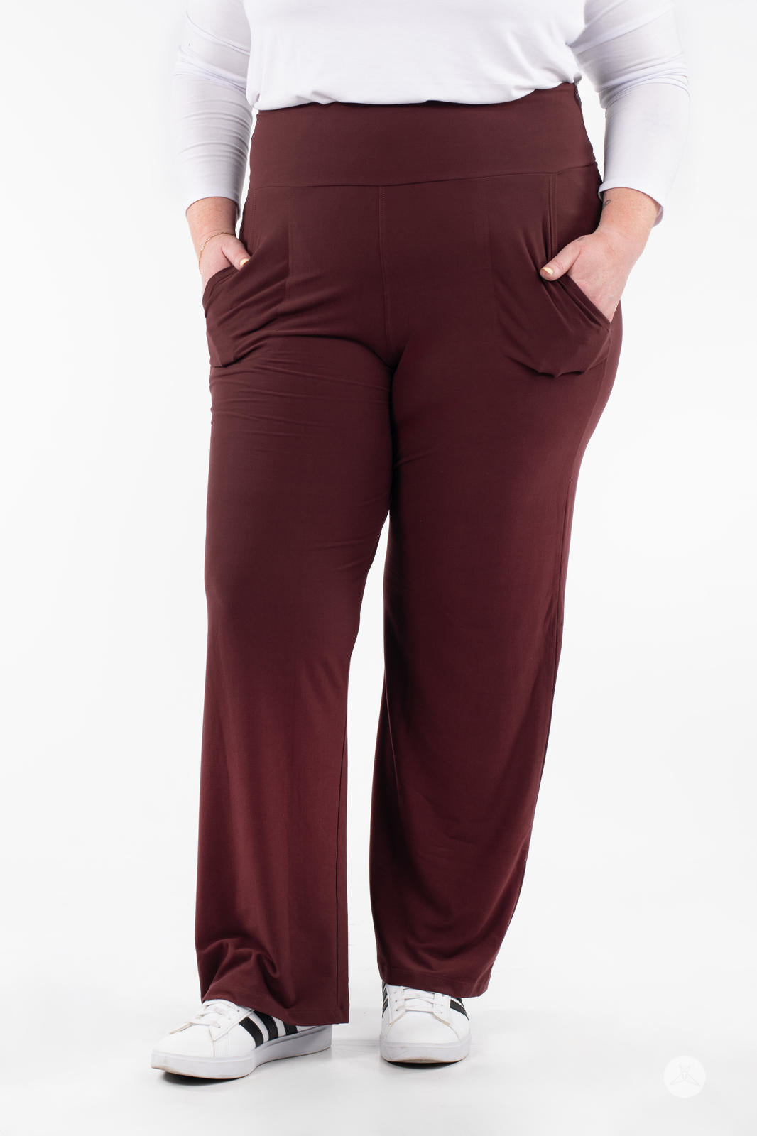 Plus-size model wearing SweetLegs High-Waist Wide Leg Pants in dark brown with relaxed fit and side pockets