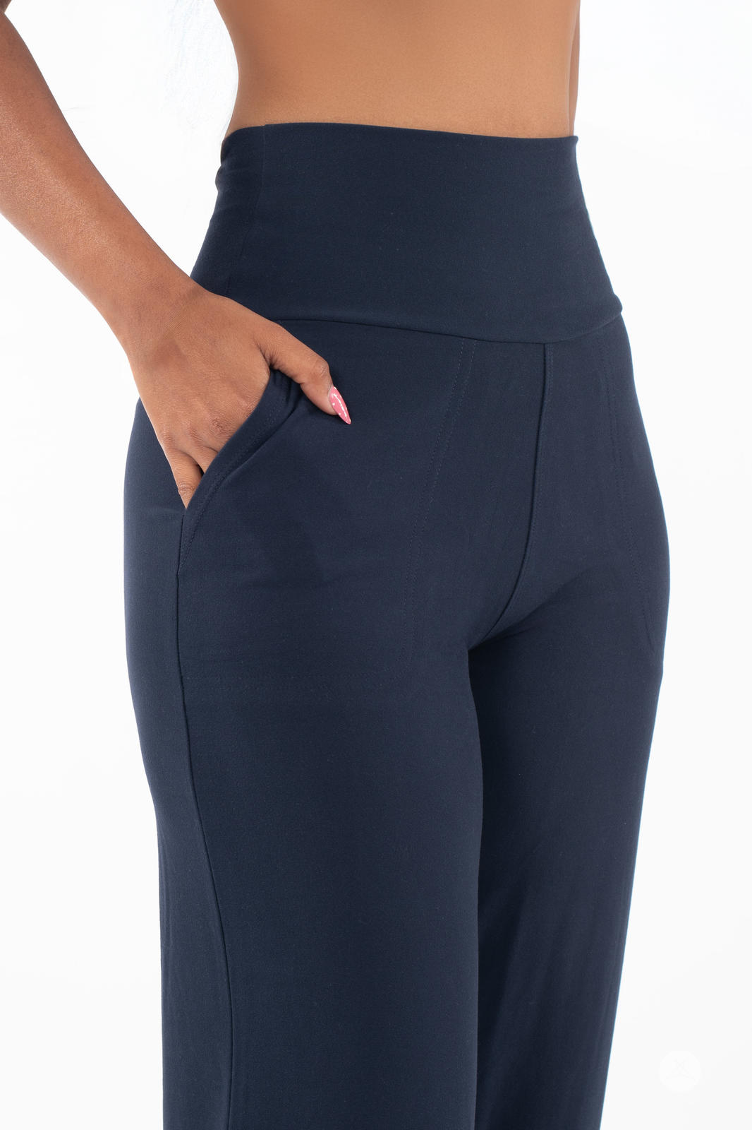 Close-up of SweetLegs High-Waist Wide Leg Pants in black featuring a smooth, fitted high waistband and side pocket detail