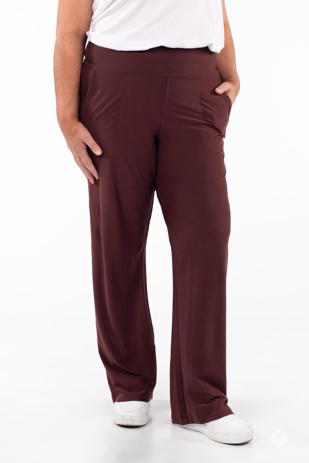Close-up of SweetLegs High-Waist Wide Leg Pants in dark brown with hand in pocket and soft fabric texture