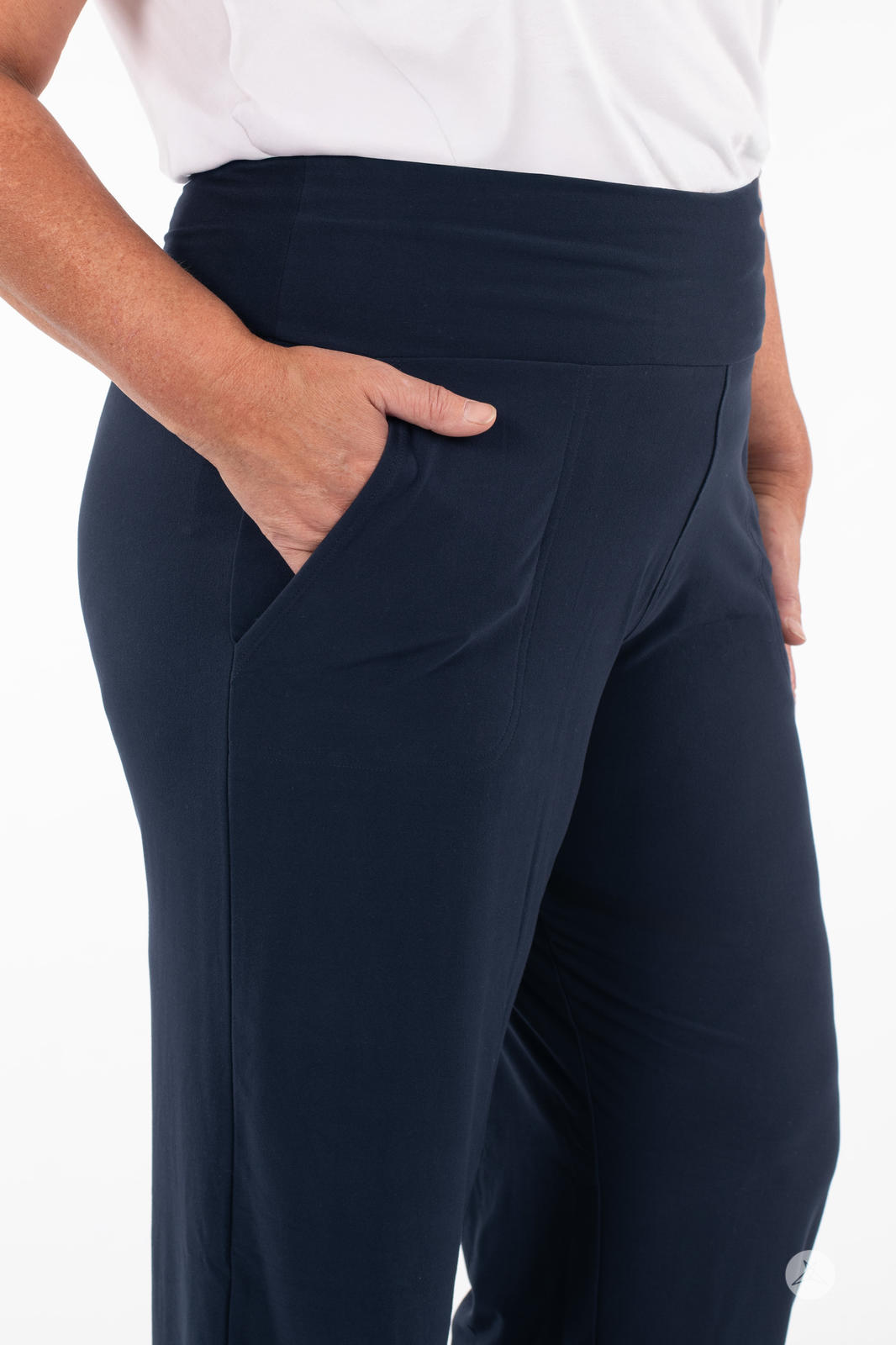 Close-up of SweetLegs High-Waist Wide Leg Pants in navy featuring smooth fabric and hand in pocket detail