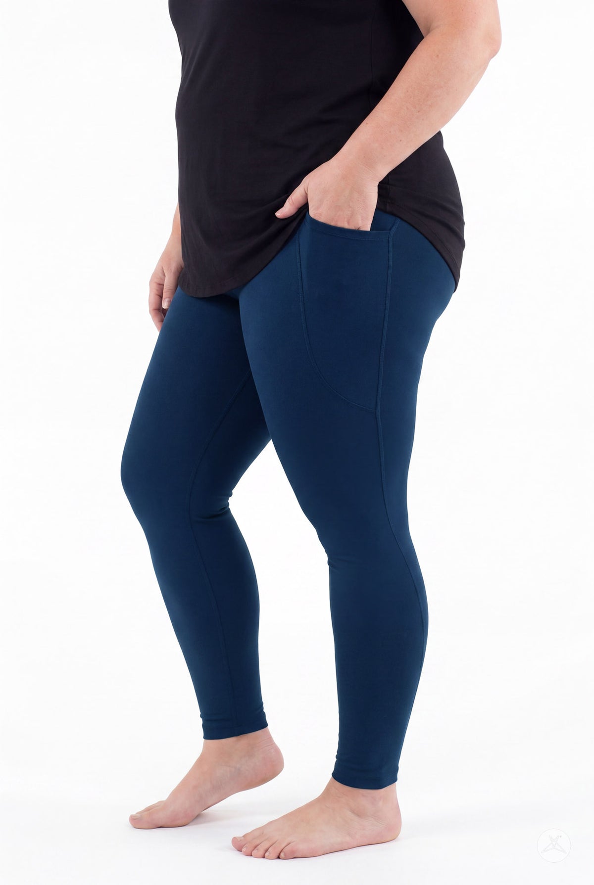 SweetLegs Still Water Pocket Leggings in navy blue with a side pocket on a model