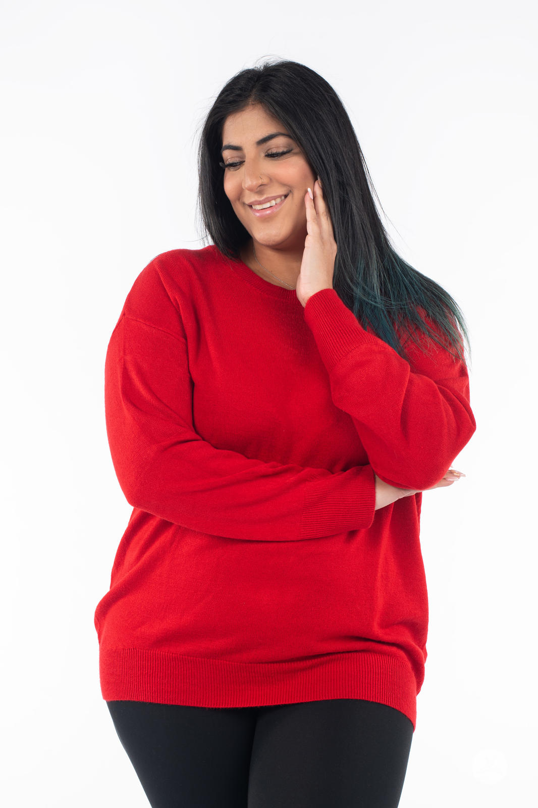 Smiling model wearing SweetTops Soft Knit Crew Neck Sweater in bold red with cozy relaxed fit and long sleeves front view