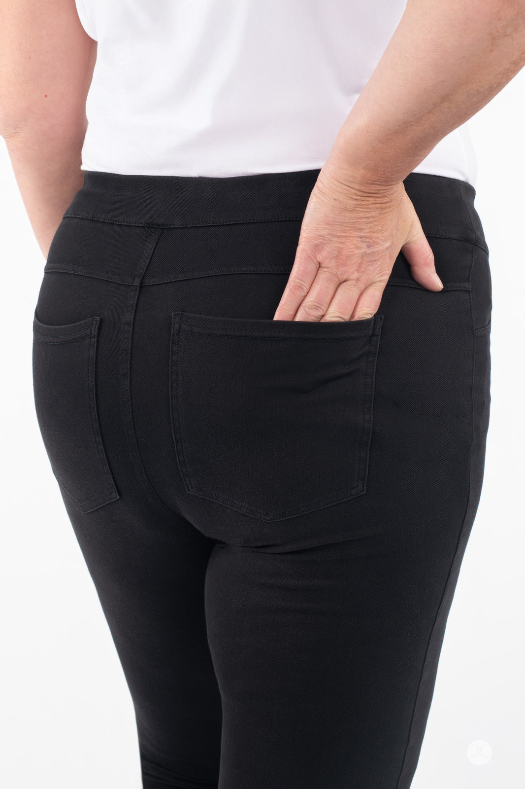 Close-up of SweetLegs Denim High-Waisted Pocket Leggings in black showing real back pockets and soft stretch fabric