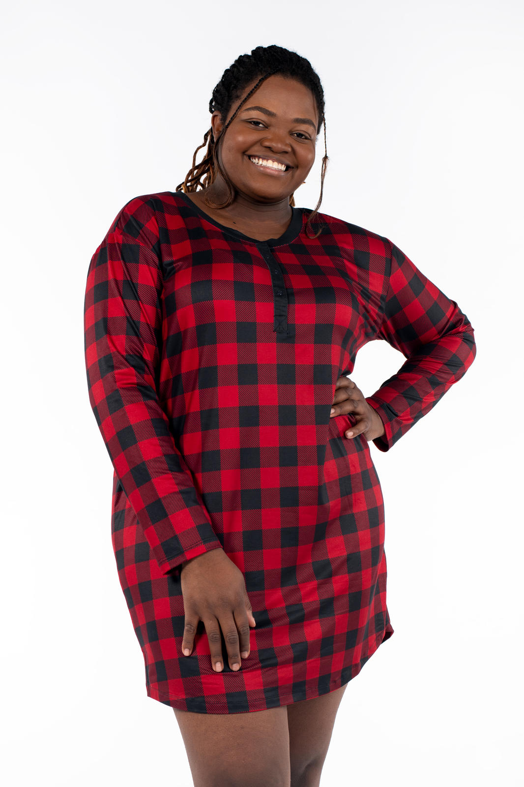 Plus size model smiling wearing SweetTops Henley Sleep Shirt in red and black buffalo plaid with relaxed fit front view