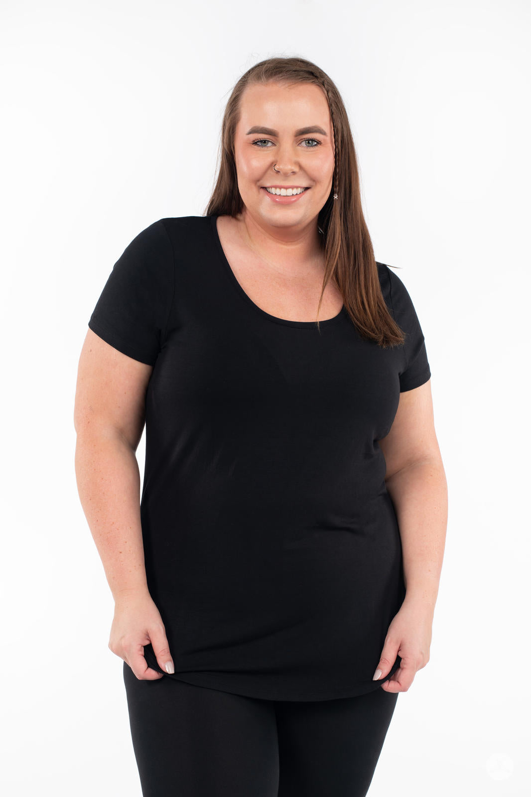 Plus-size model wearing SweetLegs Canada Scoop Neck Tee in black with modern scoop neckline and short sleeves front view