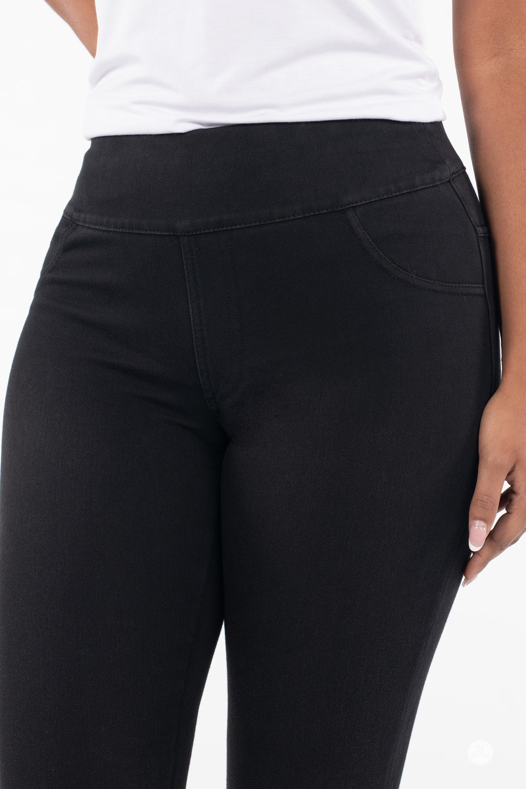 Close-up of SweetLegs Denim High-Waisted Pocket Leggings in black showing smooth fabric and fitted waistband detail
