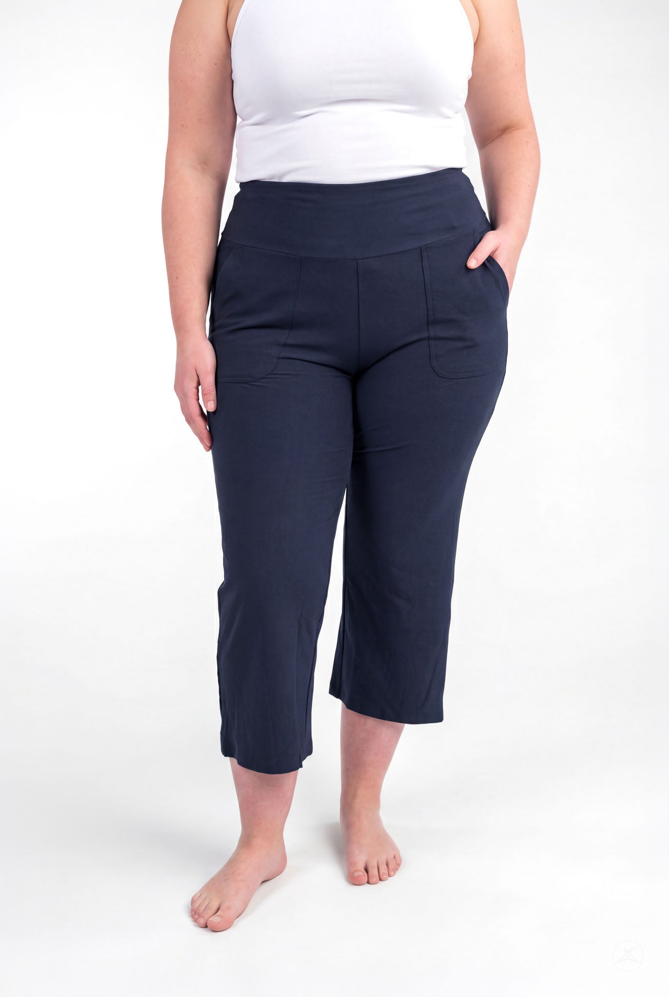 Plus size person wearing navy High-Waist Wide Leg Crops by sweetlegs standing barefoot with one hand in pocket