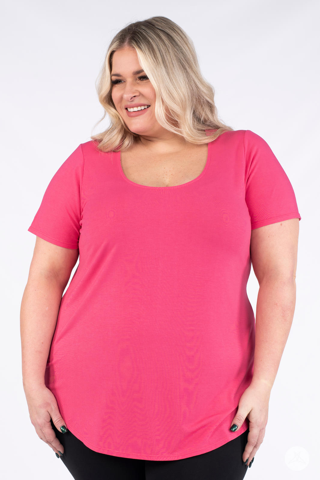 Plus size woman smiling wearing bright pink Classic Tee by SweetLegs Canada with scoop neck front view
