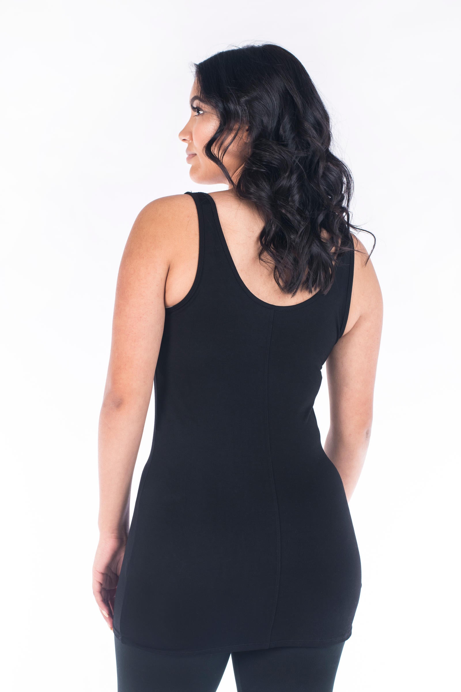 Woman showing back view of SweetLegs Canada Classic Layering Tank in black with a smooth fit on white background