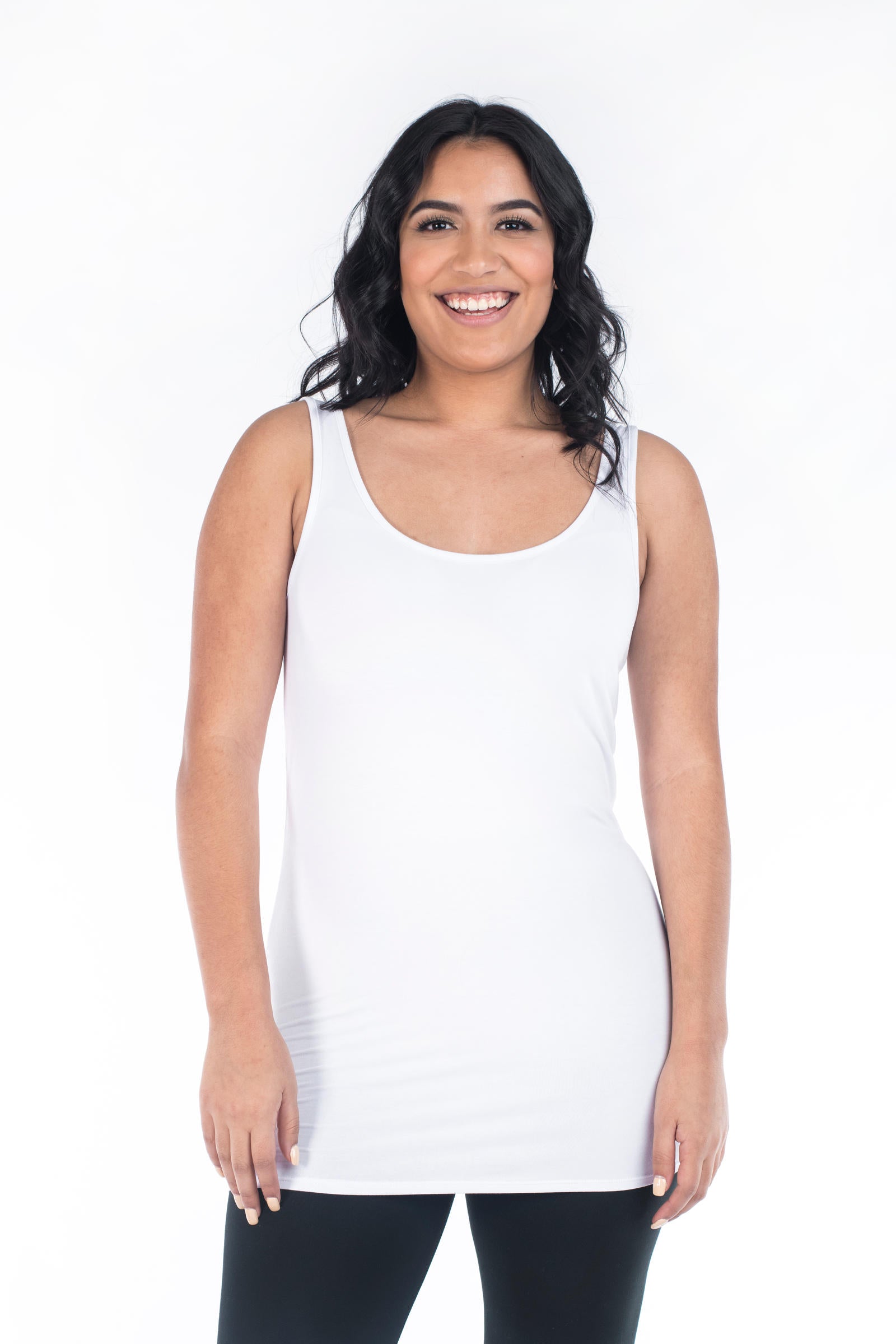 Smiling woman wearing SweetLegs Canada Classic Layering Tank in white with a smooth, versatile fit on white background