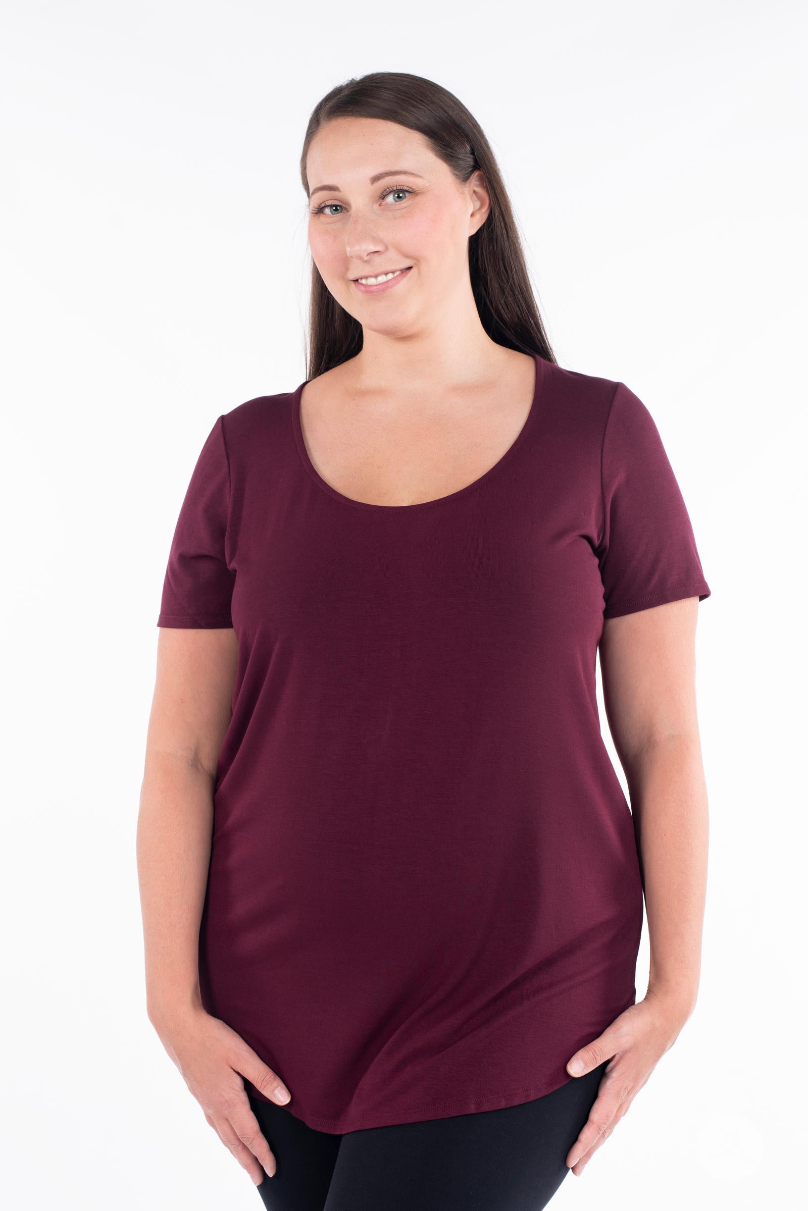 Plus size woman wearing maroon Classic Tee by SweetLegs Canada with scoop neck and relaxed fit front view