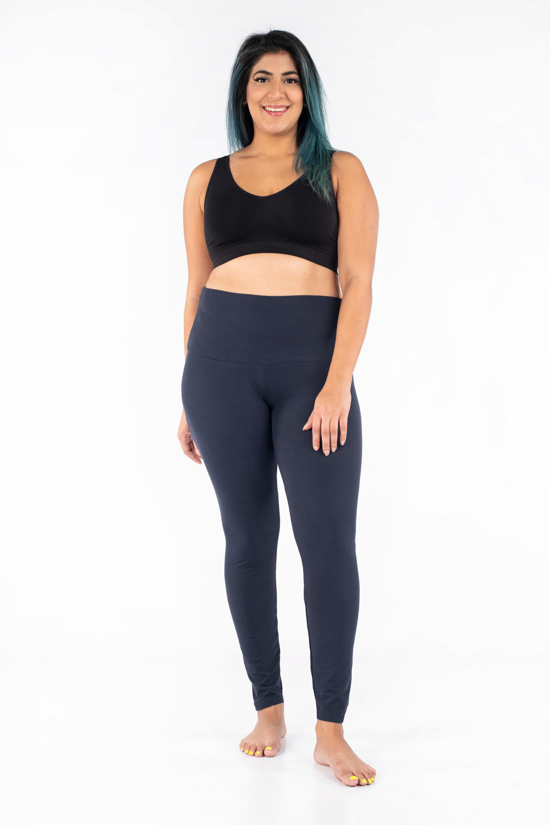 Plus-size model wearing SweetLegs Navy Wide Waistband Leggings with a mid-rise fit and smooth, stretchy fabric