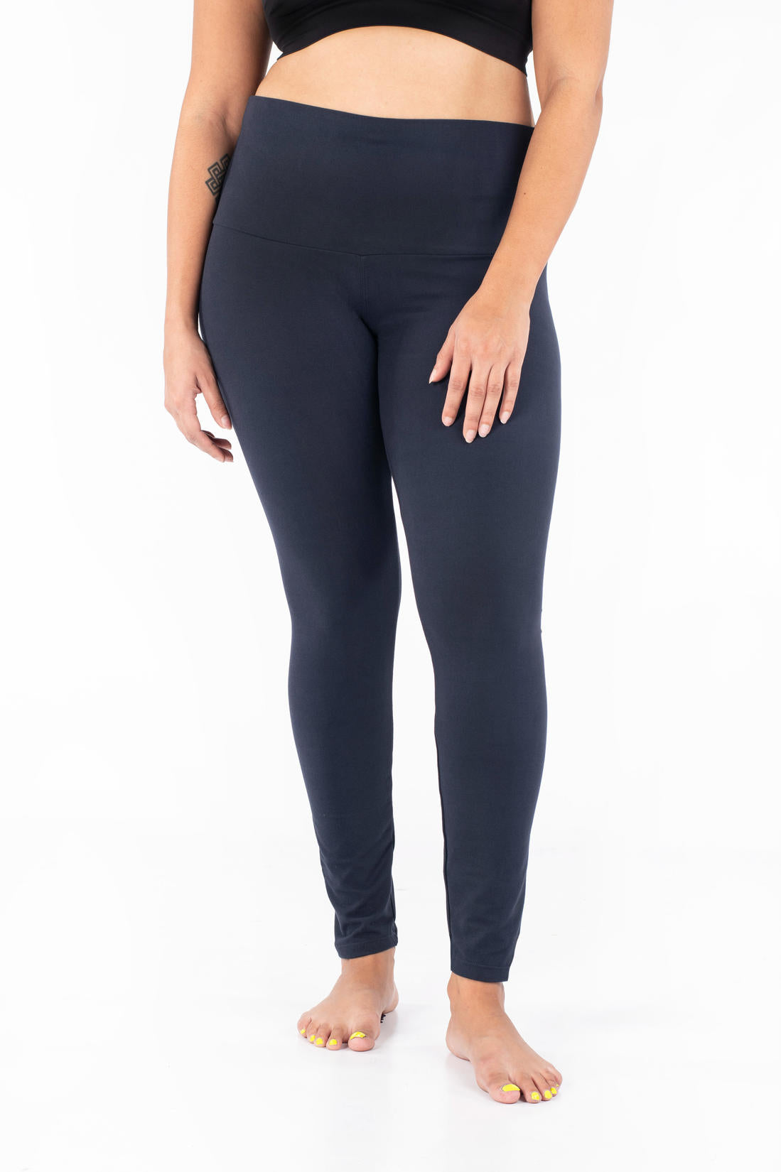 Front view of model wearing SweetLegs Navy Wide Waistband Leggings with a comfortable mid-rise wide waistband