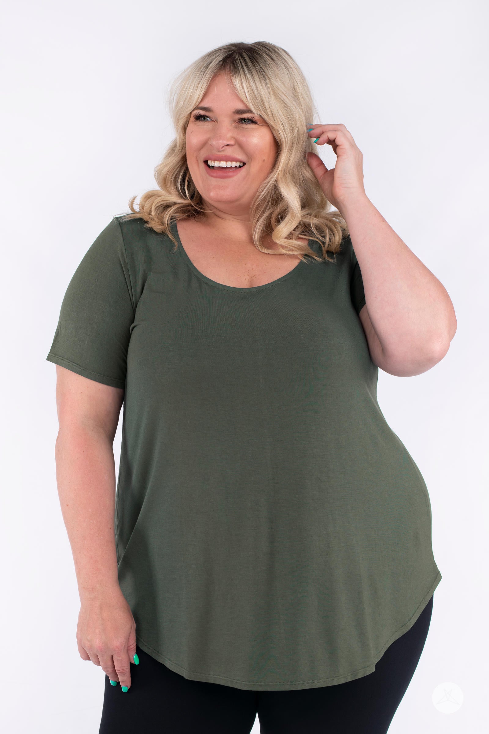 Happy plus size model wearing olive SweetLegs Canada Classic Tee with scoop neck and short sleeves facing front