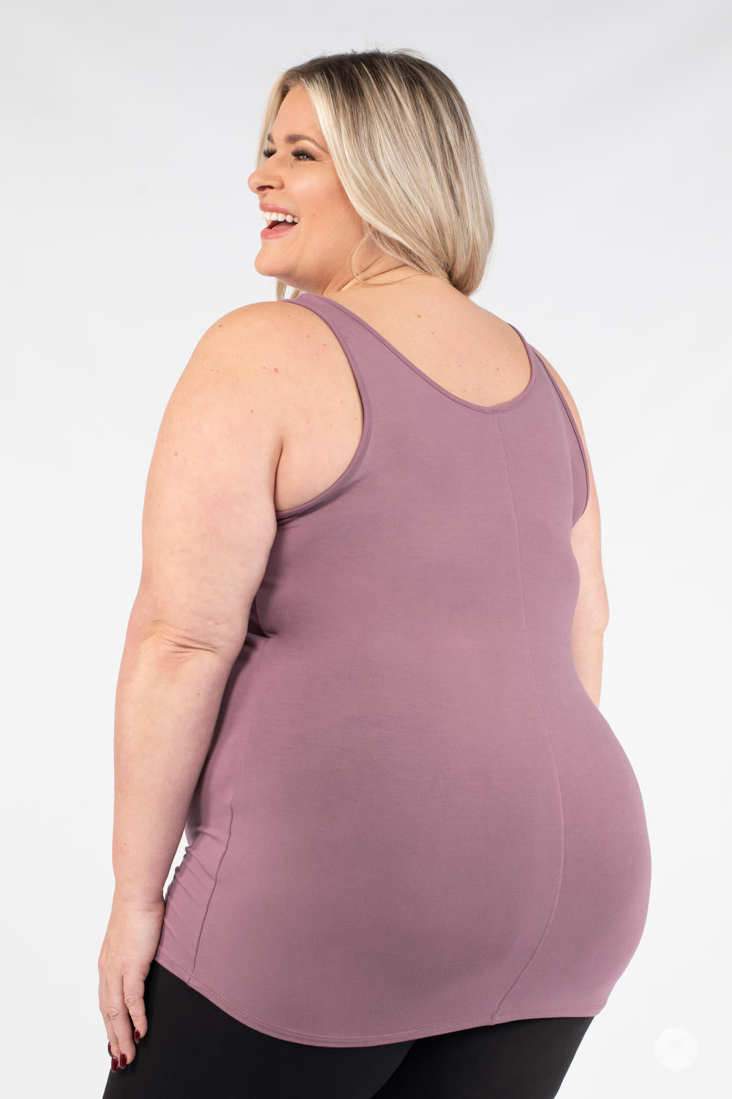 Plus-size woman smiling wearing SweetLegs Canada Classic Layering Tank in mauve with a soft, comfortable fit from behind