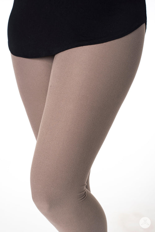 Close-up of SweetLegs Frappe leggings in muted taupe tone worn with black top on white background