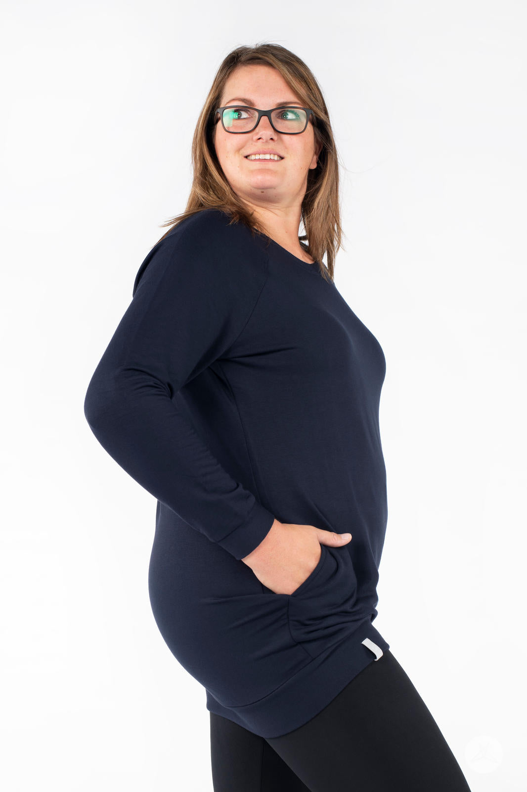 Model wearing SweetLegs Canada Everyday Raglan Pullover in navy with hand in pocket and looking sideways