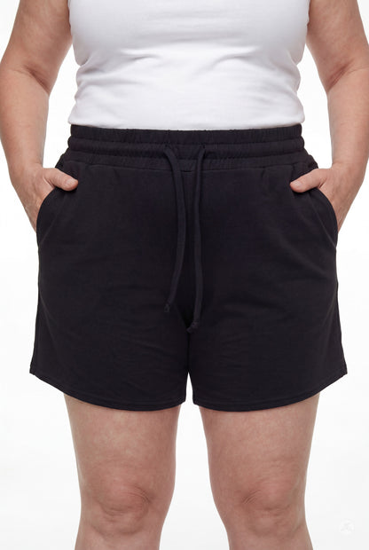 Front view of person wearing black Lounge Shorts by SweetLegs with elastic waistband and drawstring pockets
