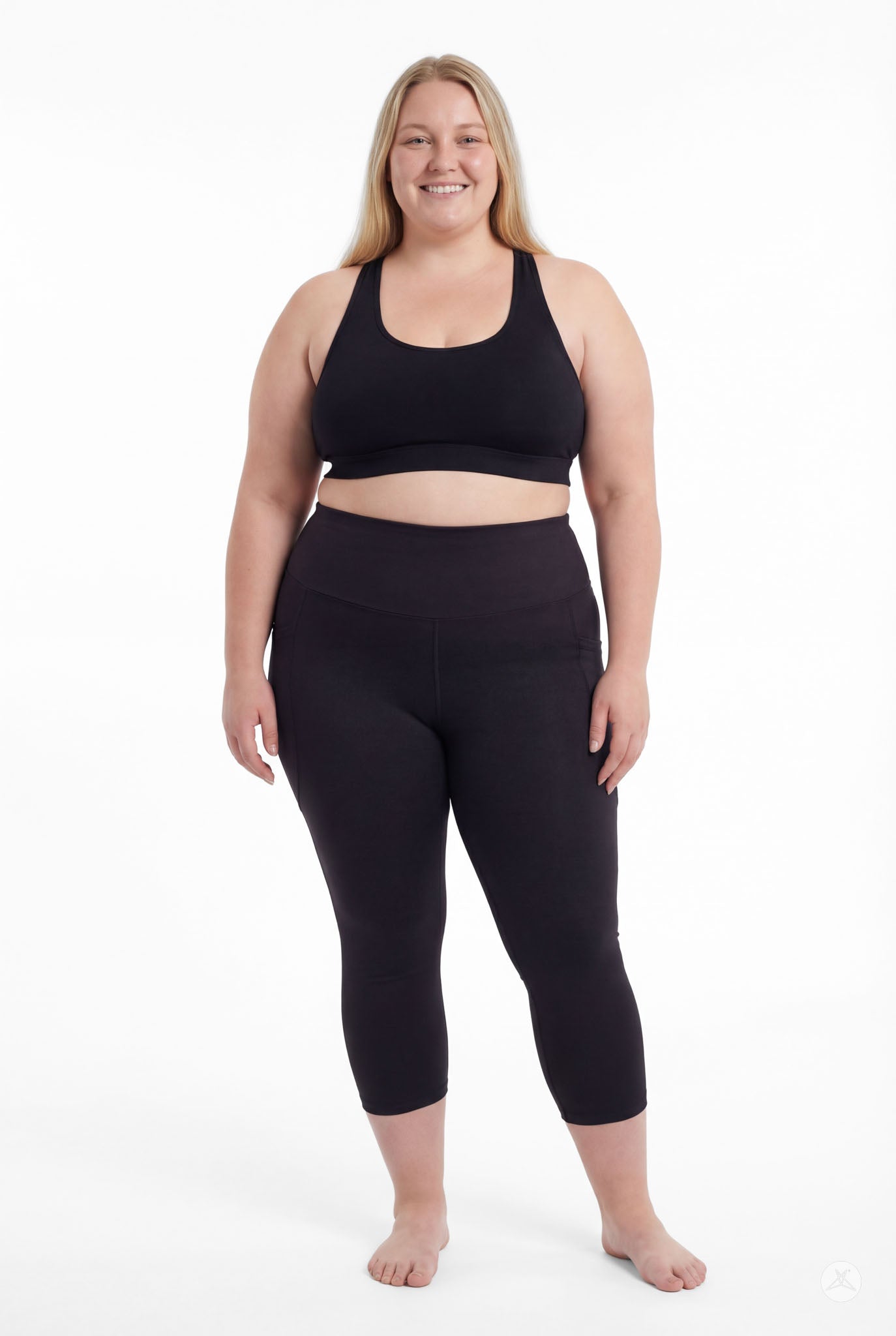 Smiling plus size woman barefoot wearing SweetLegs Black High-Waisted Pocket Crops standing facing forward relaxed