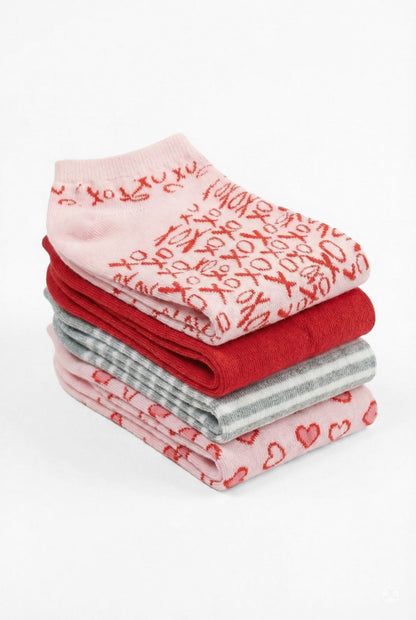 Stack of SweetLegs Heart Pop 4-Pack Ankle Socks in heart, XO, solid red, and grey stripe designs on white background