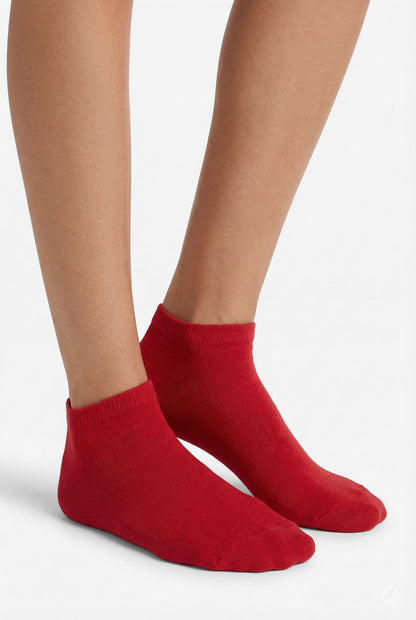 Pair of red ankle socks worn on feet from SweetLegs Heart Pop 4-Pack Ankle Socks collection