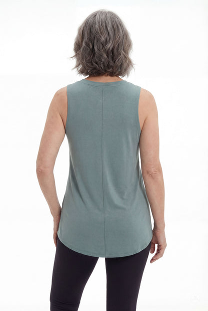 Mature woman modeling SweetTops High Neck Swing Tank in muted blue-gray with sleeveless relaxed fit viewed from back