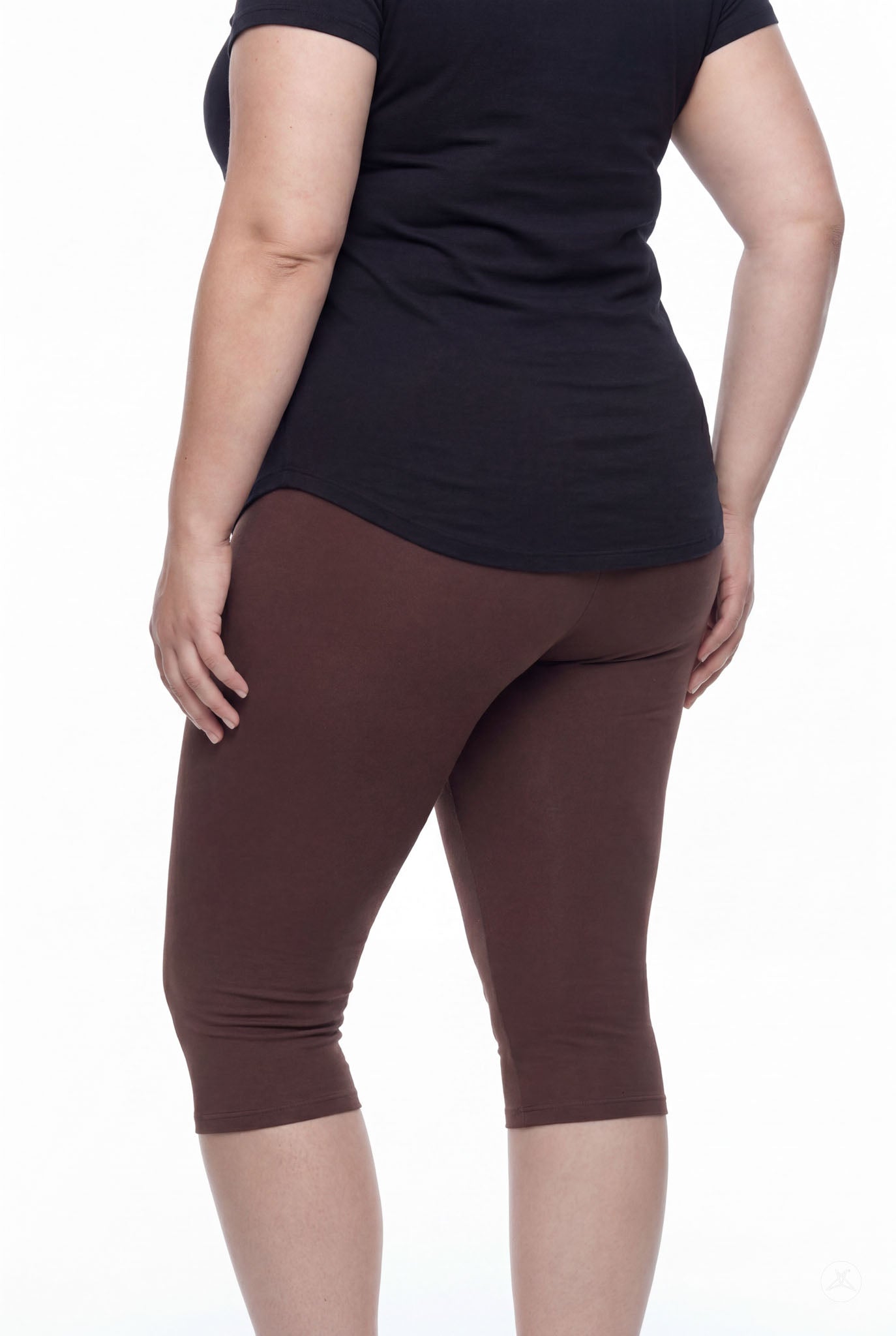 Person shown from back wearing SweetLegs Knee-Length Capri in warm walnut brown with black top on white background