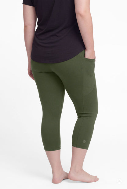 Back view of woman wearing SweetLegs Cedar Pocket Crops in olive green with side pockets and black top