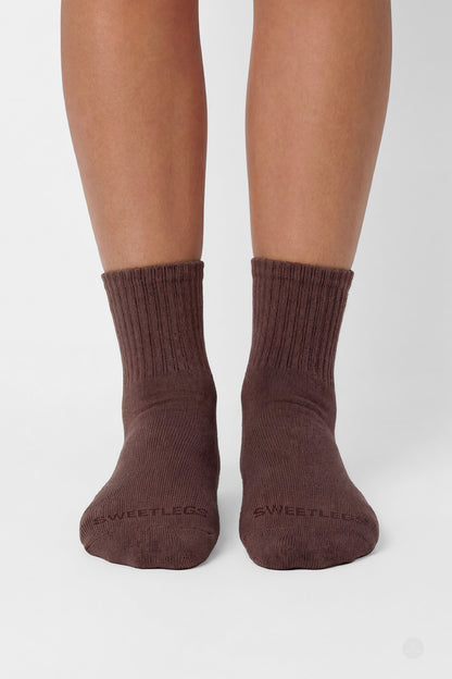 Close-up front view of feet wearing SweetLegs Classic 3-Pack Crew Socks in brown with ribbed cuffs