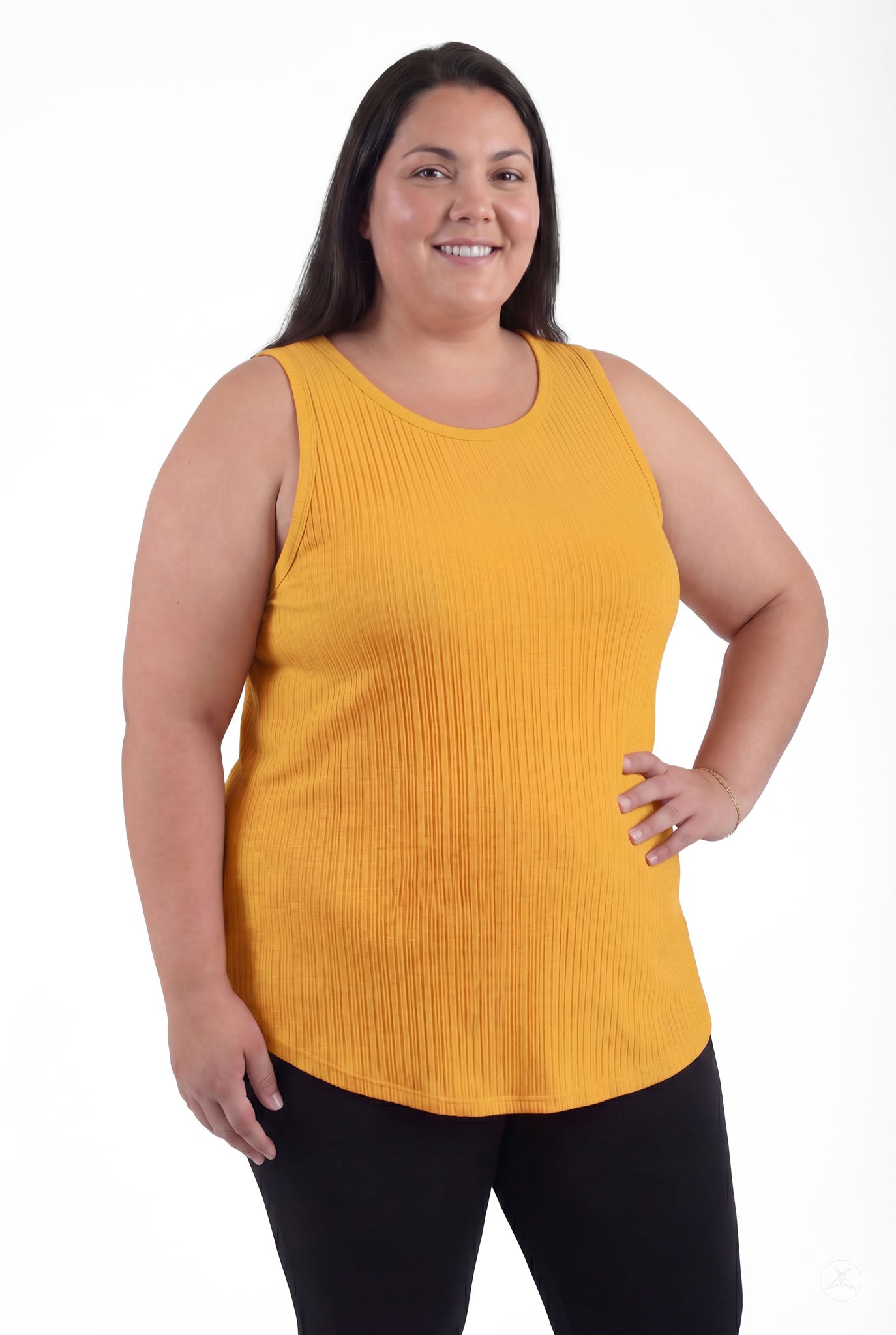Plus size model wearing The Soft Ribbed Tank in warm marigold by SweetTops with sleeveless design and ribbed fabric texture