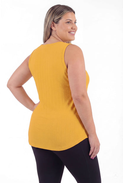 Plus size model smiling wearing The Soft Ribbed Tank in warm marigold by SweetTops showing back and ribbed texture