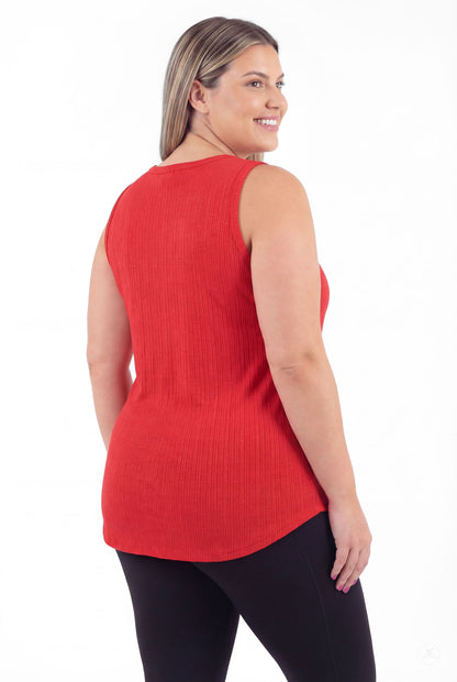 Plus size woman smiling wearing The Soft Ribbed Tank in red by SweetTops showing sleeveless back view with ribbed fabric