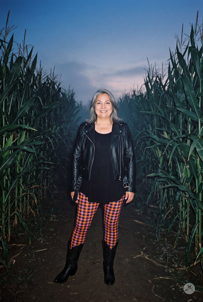 SweetLegs Witch's Wool Leggings worn by a woman in a corn maze