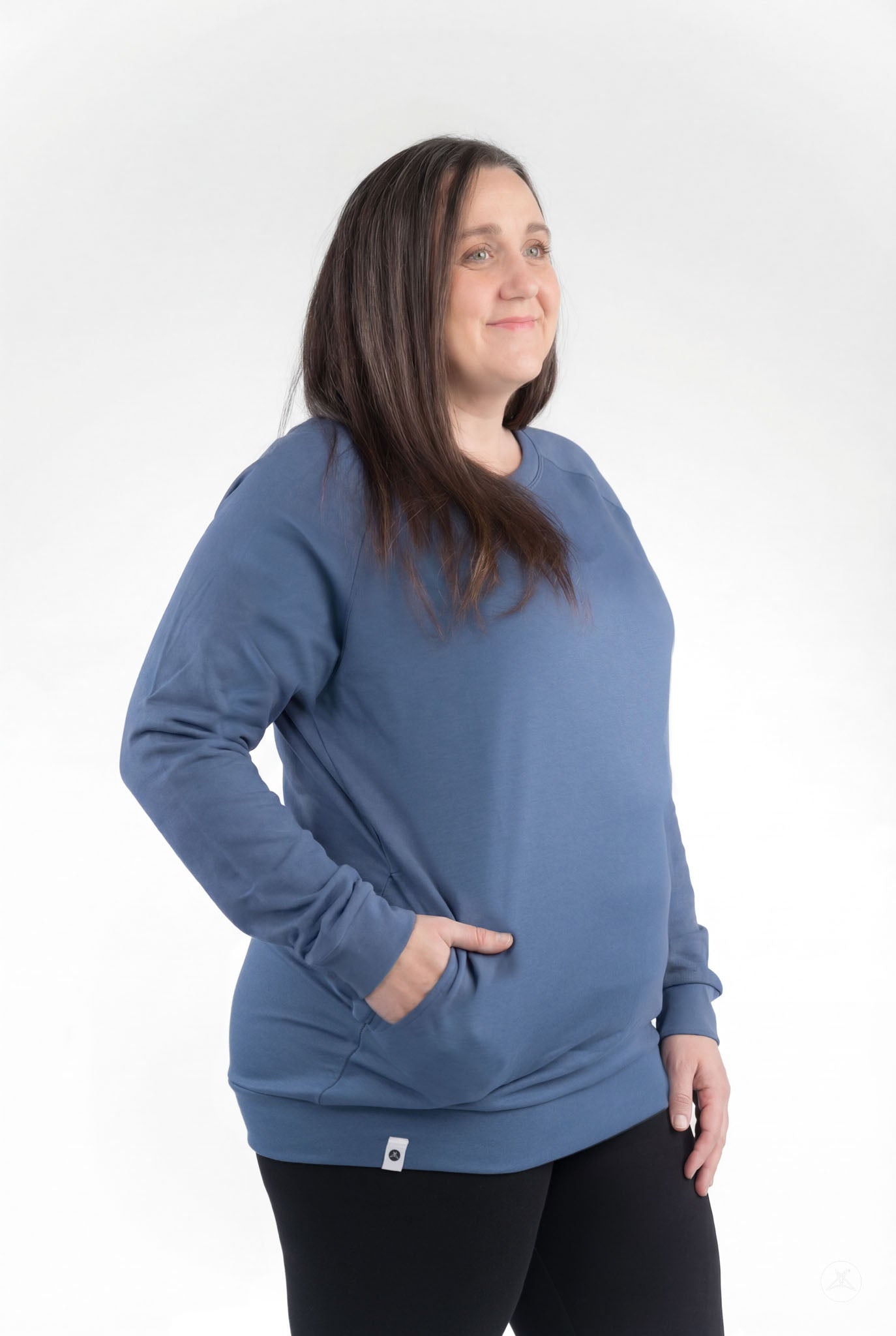 Woman wearing a blue Basic Raglan Pullover (Copy) by SweetLegs Canada with a relaxed fit and raglan sleeves