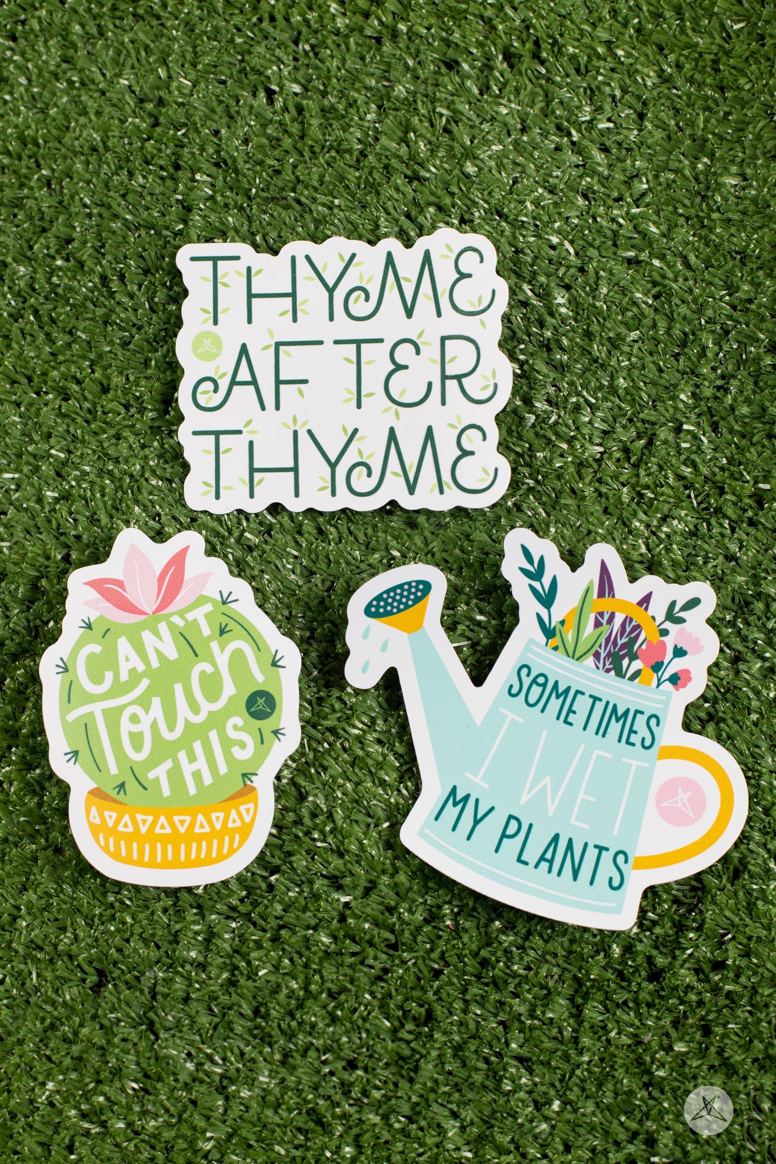 Three humorous nature-themed stickers on grass including Thyme After Thyme Sticker Pack by sweetlegs with plant designs