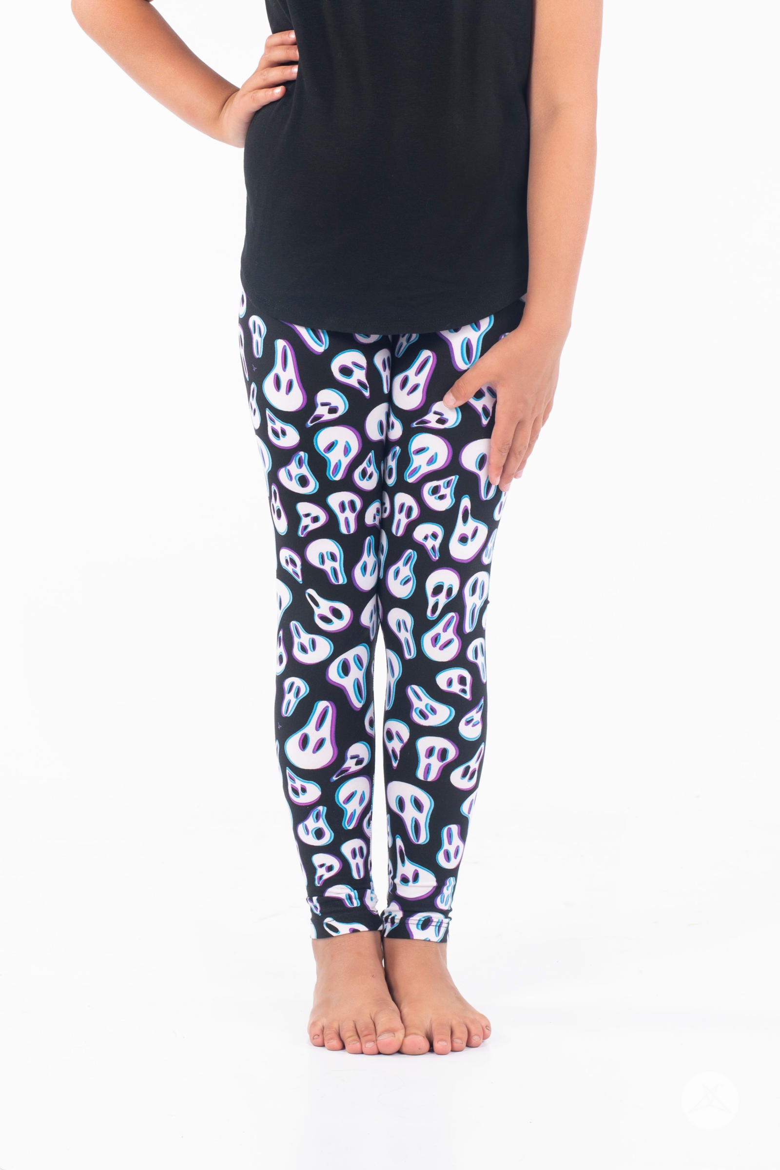 Follow Your Screams Kids leggings by SweetLegs with icy blue and purple scream faces on black worn by child barefoot